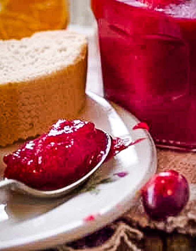close up of cranberry curd on spoon
