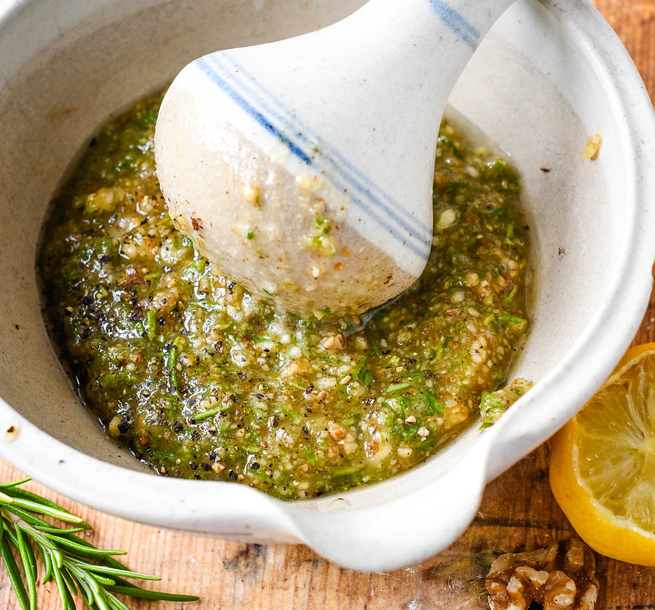 rosemary and walnut pesto in mortar with pestle