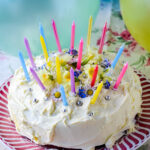 red velvet birthday cake with candles