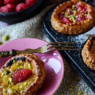 rhubarb and raspberry tarts by larderlove