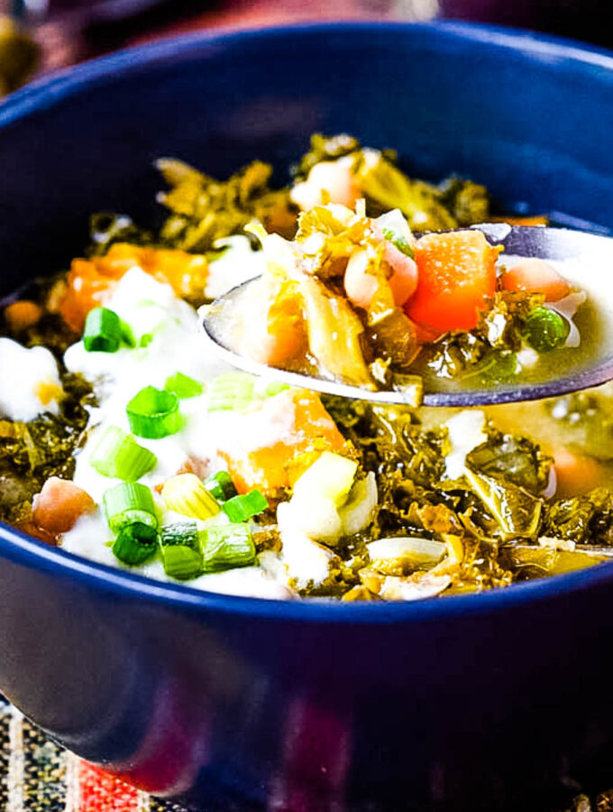 bowl of squash kale and chickpea soup