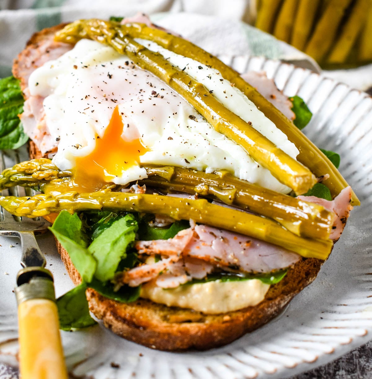 pickled asparagus on poached eggs