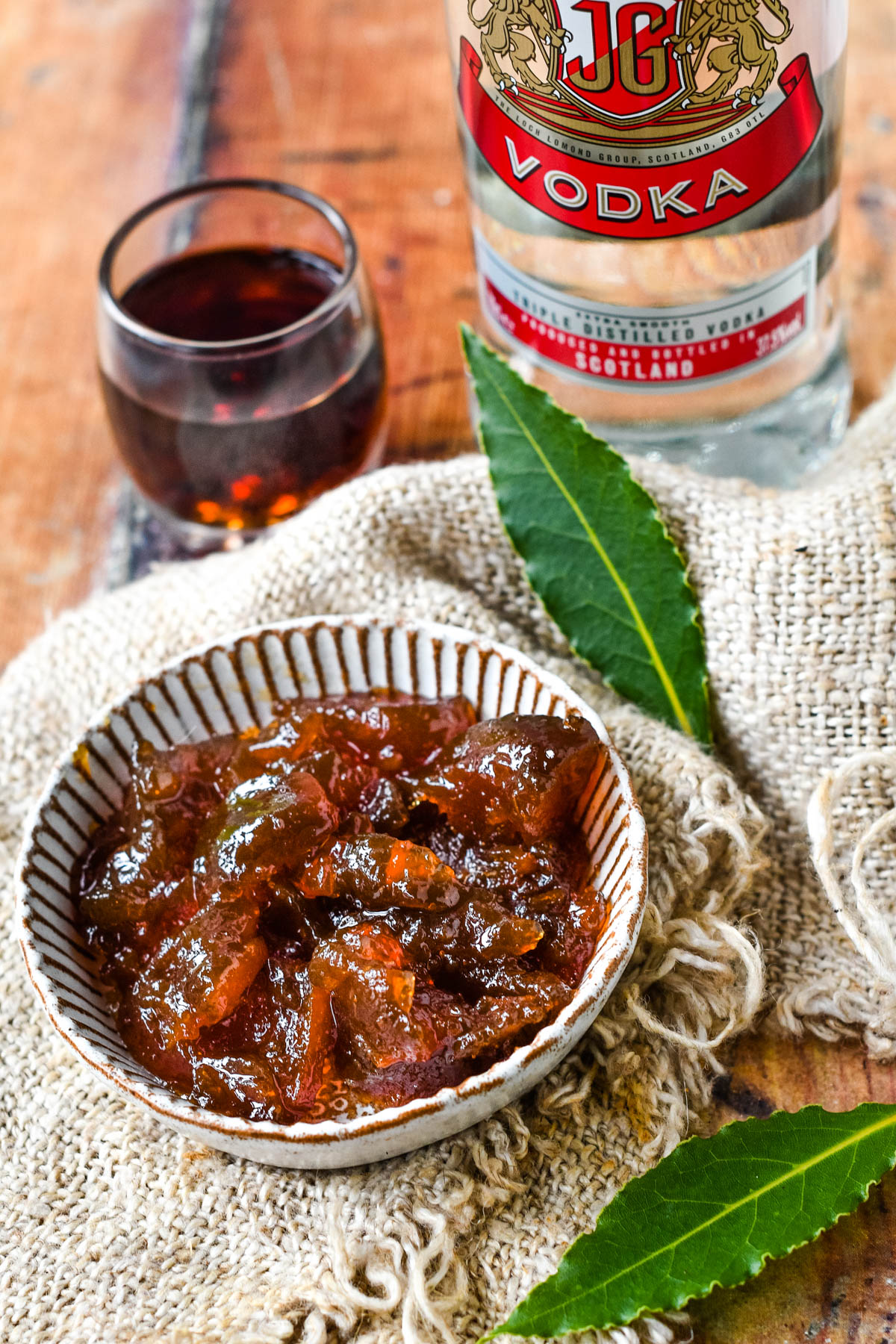 ingredients - marmalade, vodka, bay leaves and red vermouth