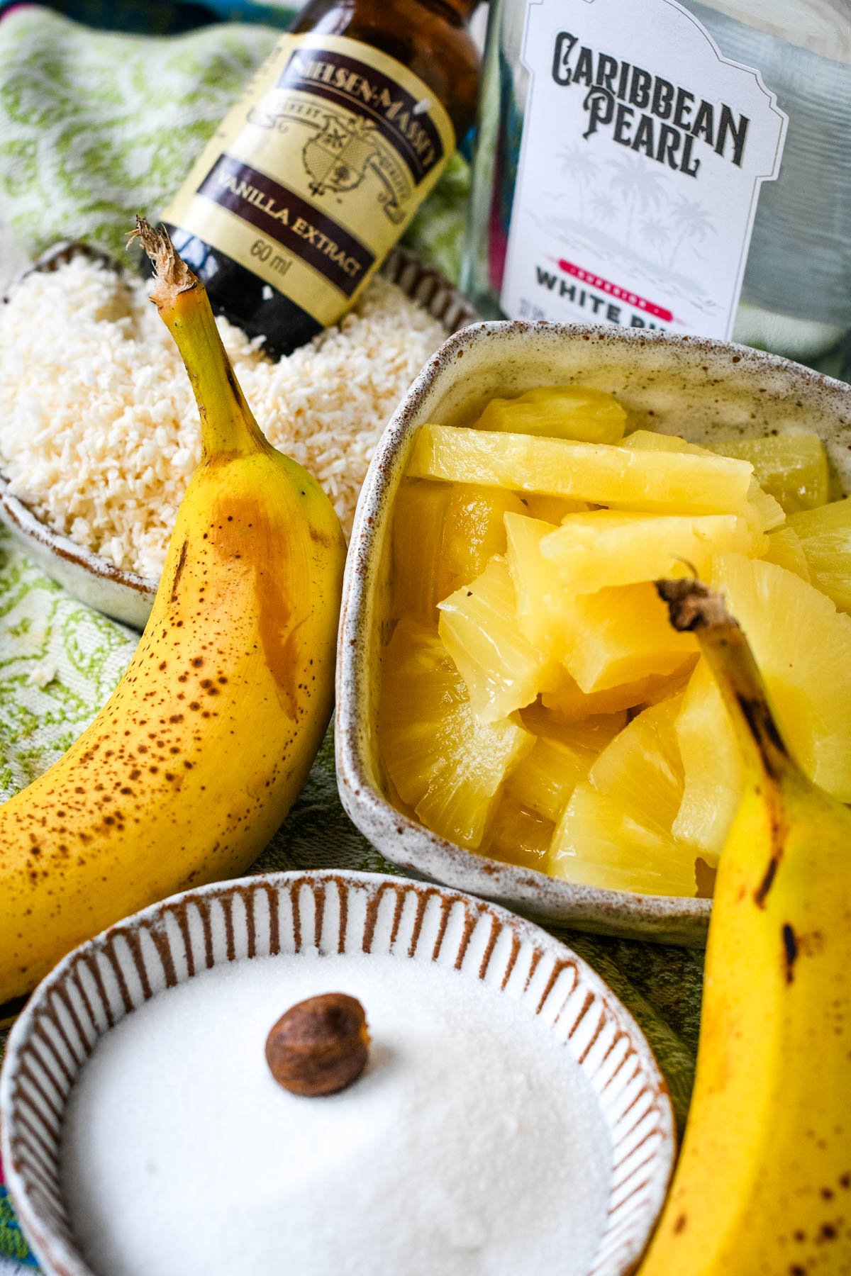 ingredients for tropical liqueur on table