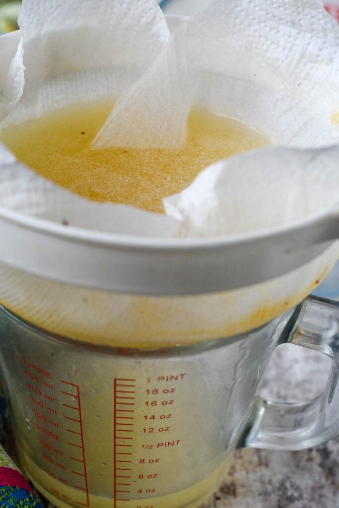 straining the resulting liqueid through kitchen roll