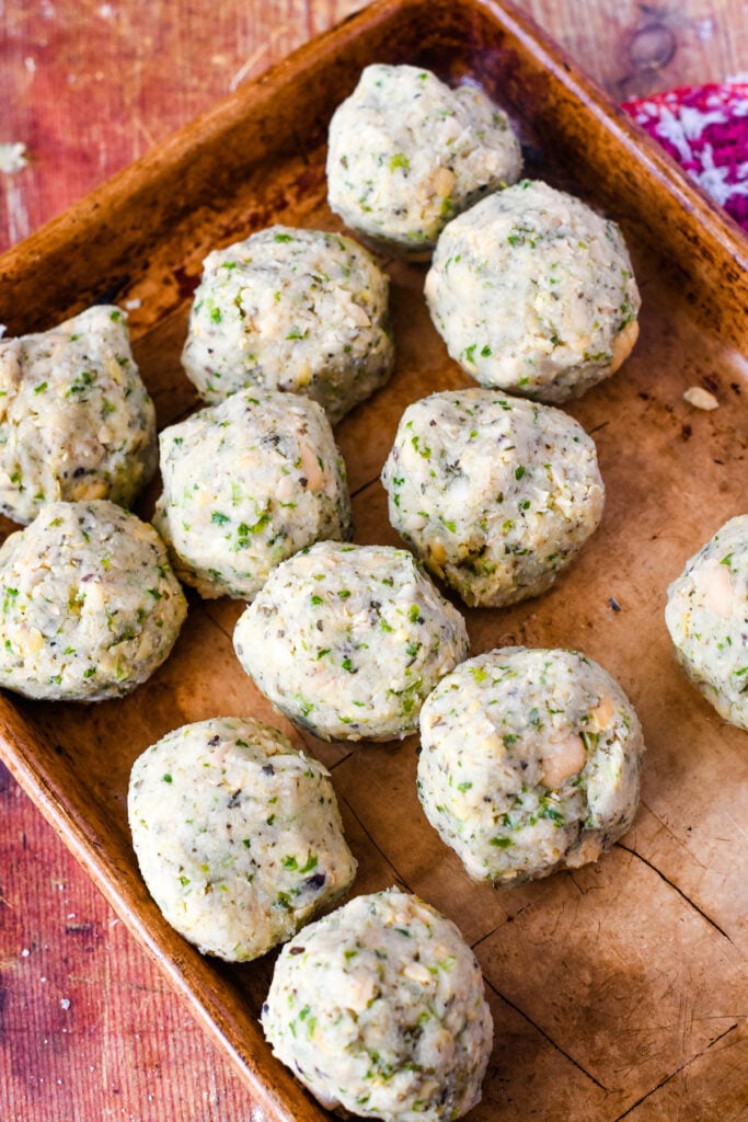 vegan meatballs ready to be baked on oven tray
