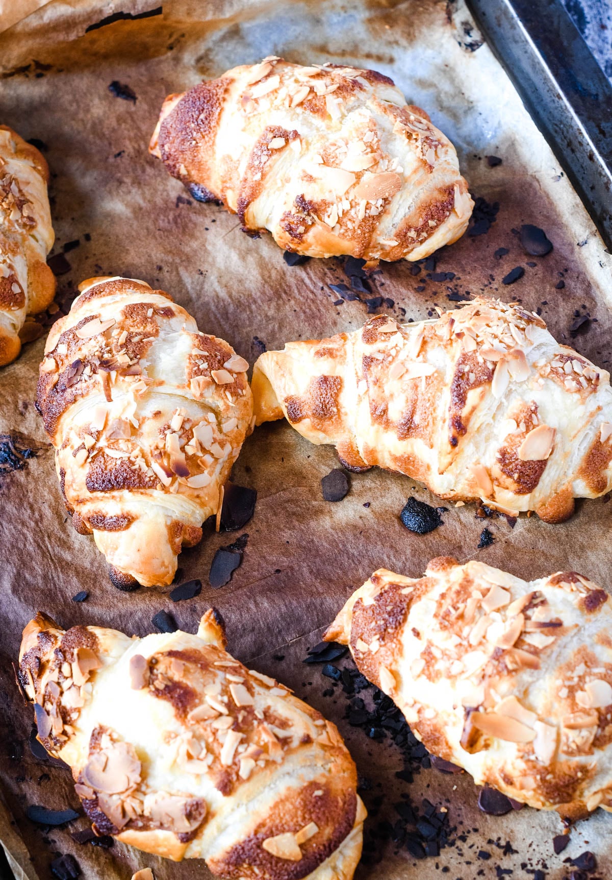 baked croissants on baking tray just out of oven