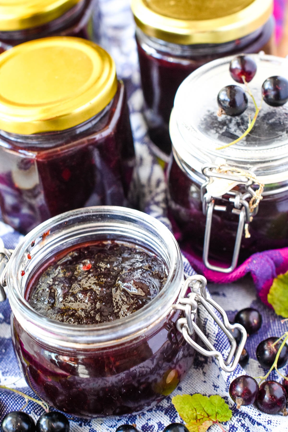 jars of blackcurrant chutney on table