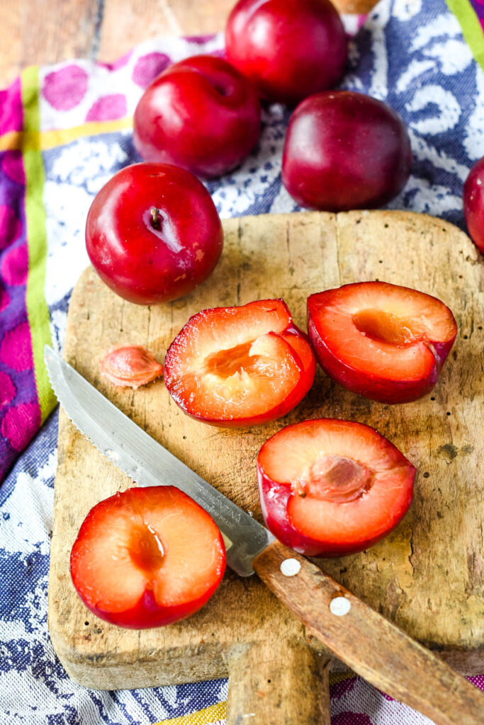 removing the stones from plums