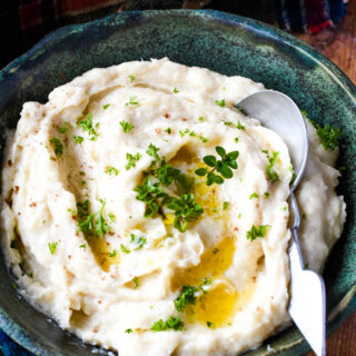 parsnip puree in bowl with spoon