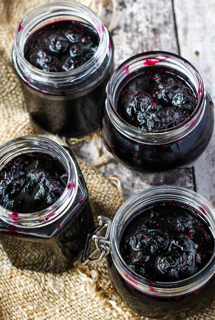 finished jars of blueberry jam on the table