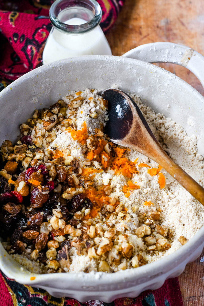 scone mix in bowl with wooden spoon