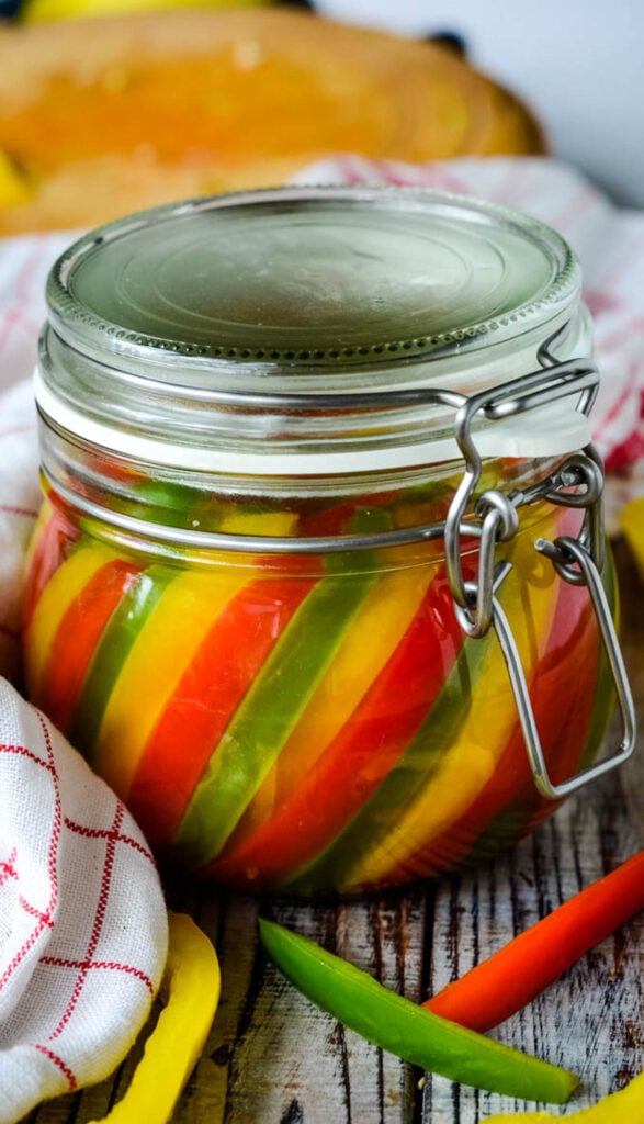 Round jar of mixed pickled peppers