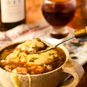 bowl of French onion soup with spoon